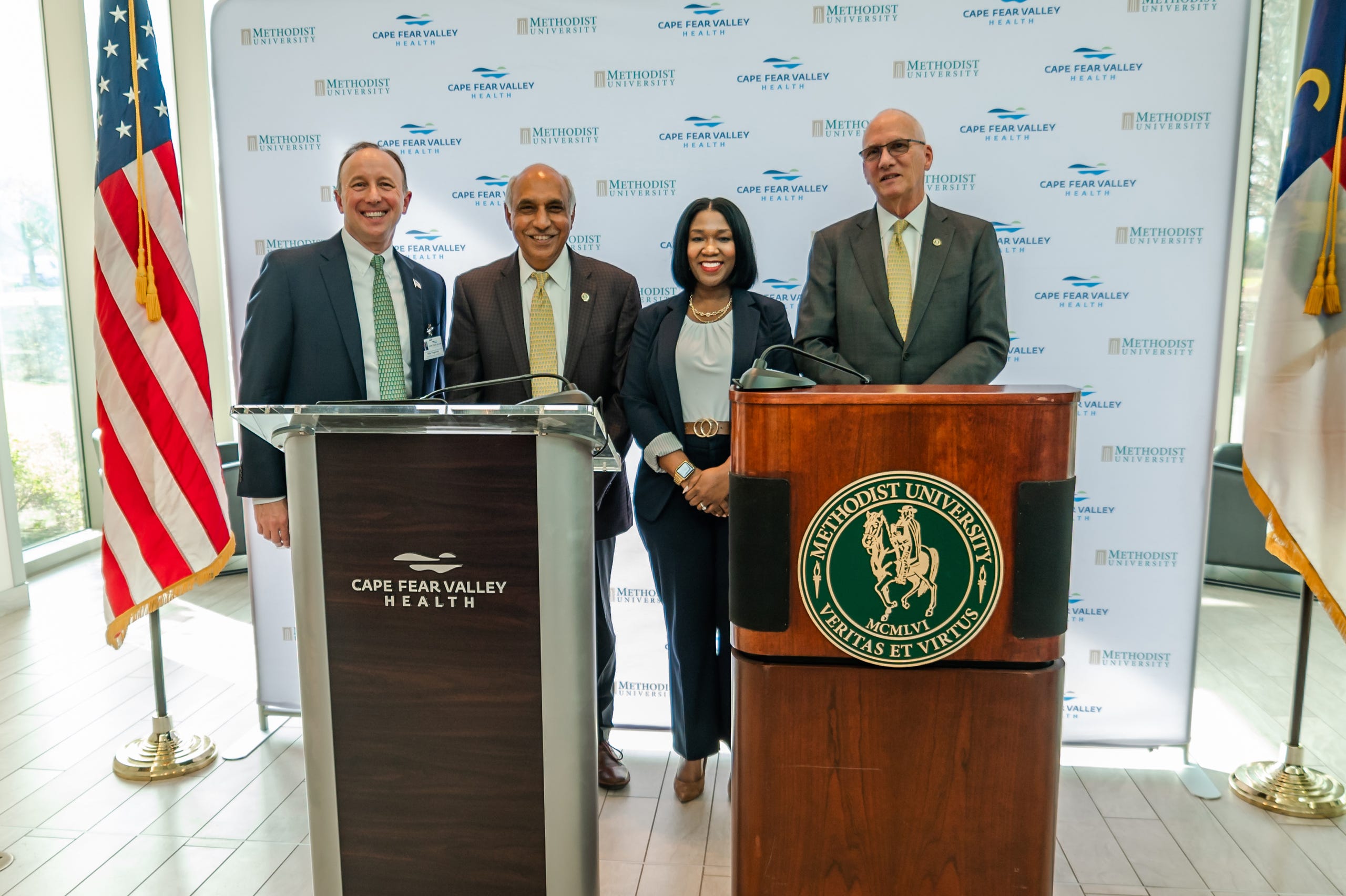 Mike Nagowski, CEO of Cape Fear Valley Health; Dr. Rakesh Gupta, chair, Methodist University Board of Trustees; Alicia Flowers, chair, CFVH Board of Trustees; and Dr. Stanley T. Wearden, president of Methodist University, announce a partnership between the university and health system in February 2023. 