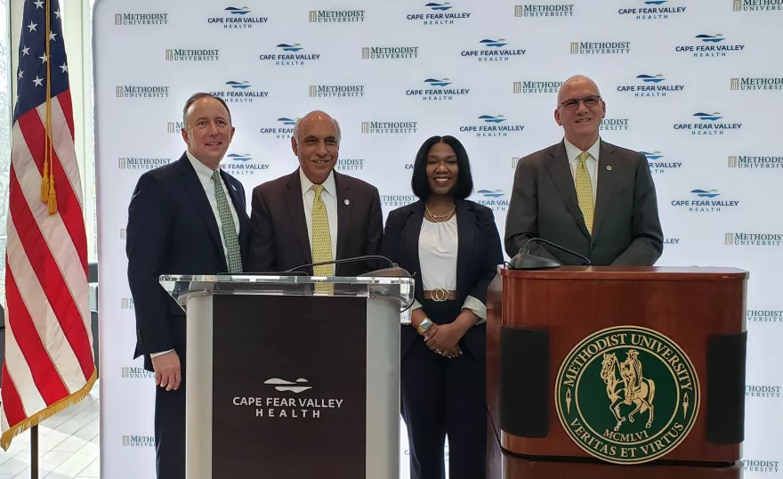 Officials with Cape Fear Valley Health System and Methodist University announced a partnership on a new medical school in a press conference on Monday, Feb. 27, 2023. From left are Mike Nagowski, Cape Fear Valley CEO; Dr. Rakesh Gupta, chairperson of the Methodist University Board of Trustees; Alicia Marks Flowers, chairperson of the Cape Fear Valley board; and Dr. Stanley T. Wearden, president of Methodist University. The event was held at he Thomas R. Mclean Health Sciences Building on the Methodist campu