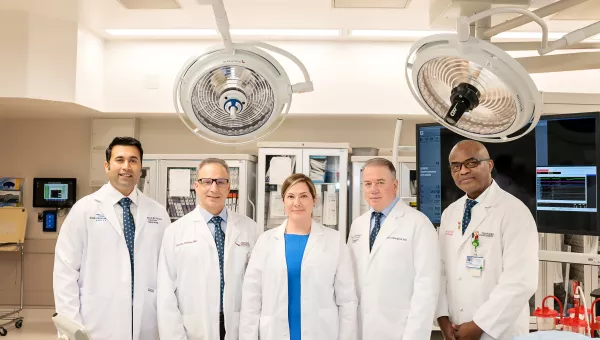 Heart Surgeon team in an operating room