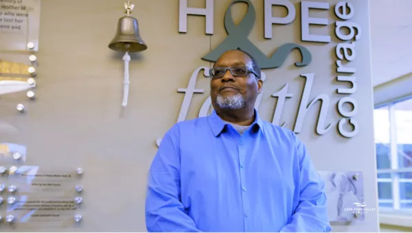 patient smiling in cancer center