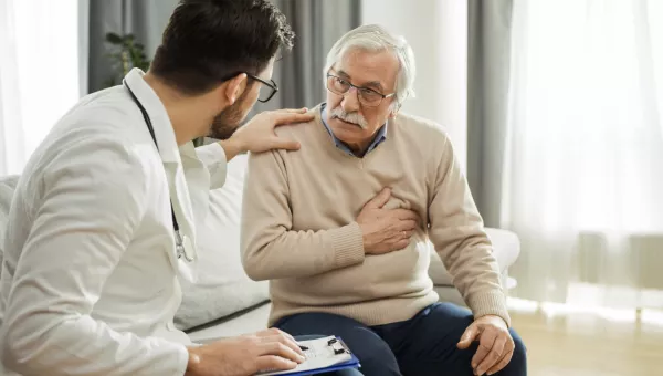 Man talking to his doctor about heart problems