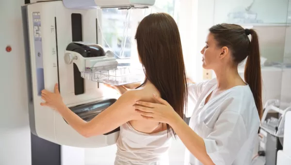 woman getting mammogram