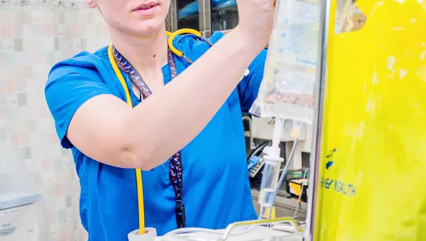 Nurse hanging an I.V